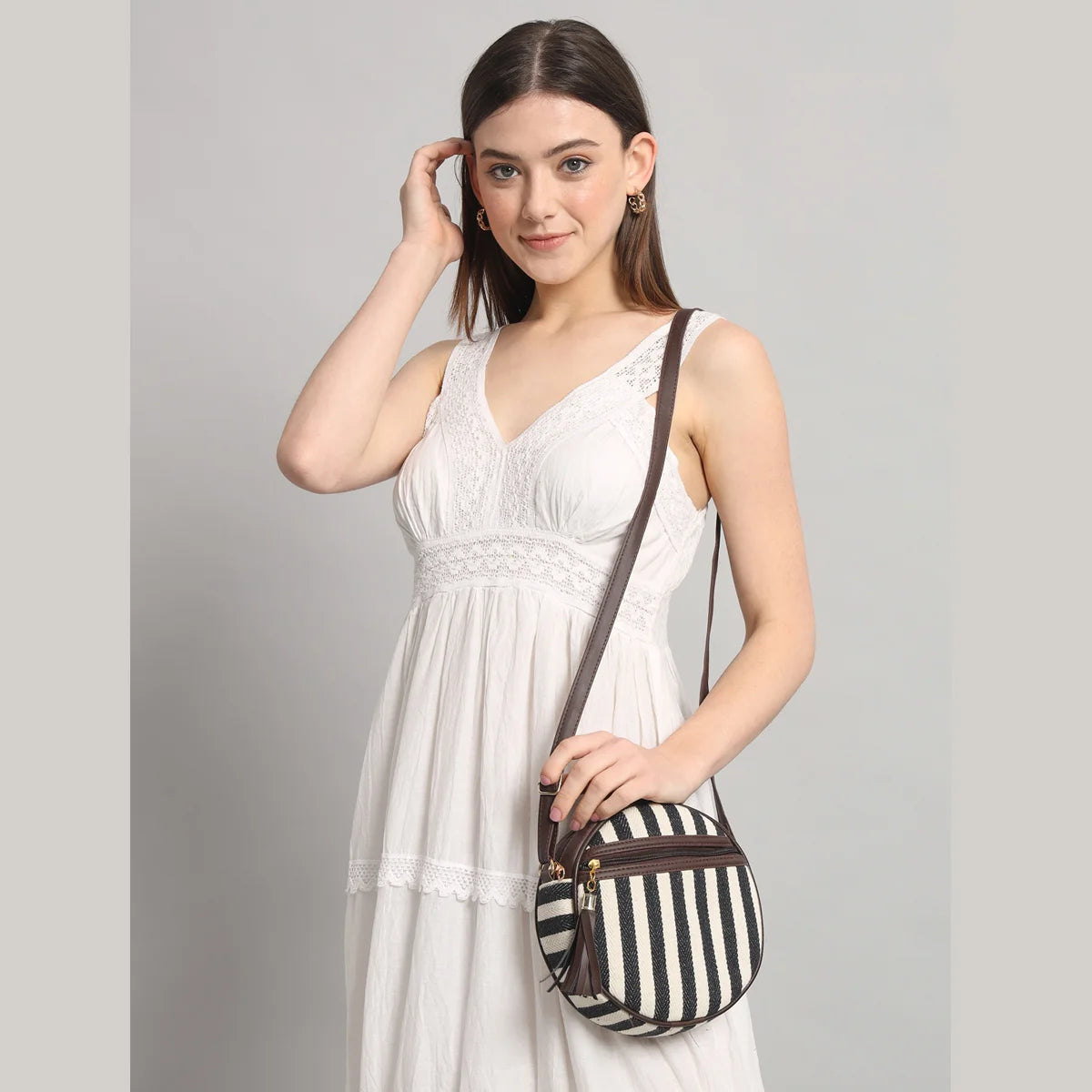 Flicker Jacquard Round Sling Bag - Stripes
